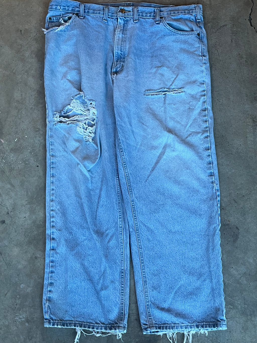 Light-wash Carhartt Jeans with rips and distressing- 44x32